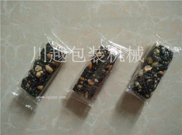 供應砂糖包裝機 單個(gè)奶糖裝袋設